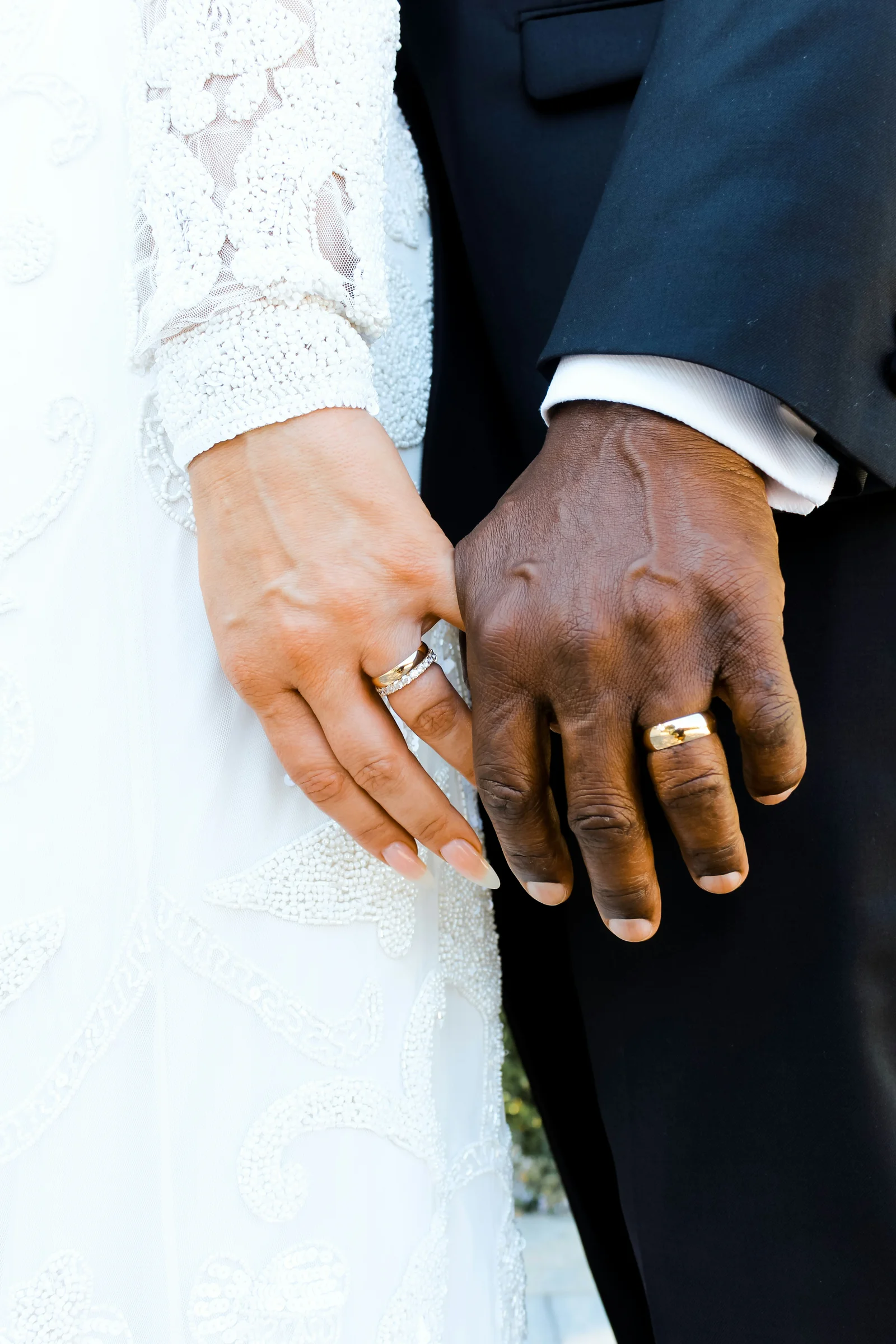 Newly weds holding hands